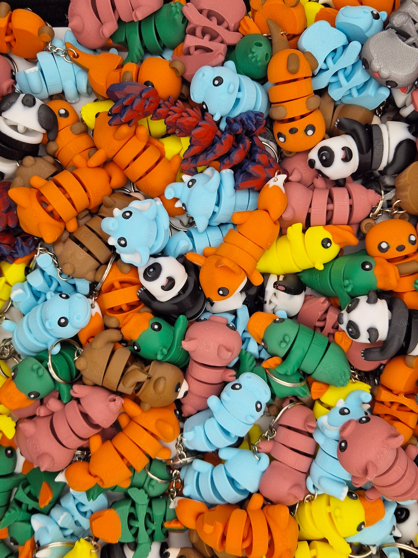 Verschillende 3D geprinte sleutelhangers.